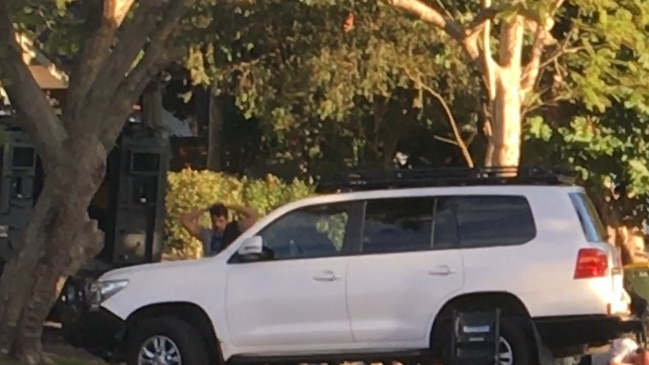 Heavily armed police stormed the house just after sunrise. Picture: John Myers