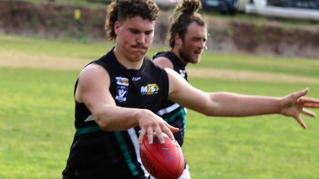 Omeo-Benambra's Jai Hayward kicks his team forward against Swan Reach. Picture: Rod Twining