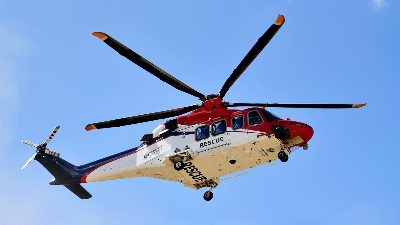 A QGAir helicopter will be assisting with the recovery operation. Picture: Alix Sweeney