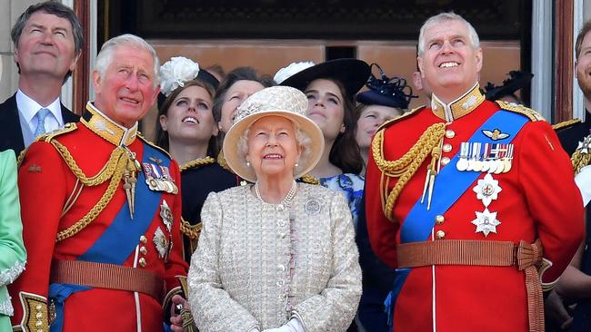 Prince Charles, Prince of Wales, Queen Elizabeth II, and Prince Andrew, Duke of York stand with other members of the Royal Family on the balcony of Buckingham Palace to watch a fly-past of aircraft by the Royal Air Force, in London.