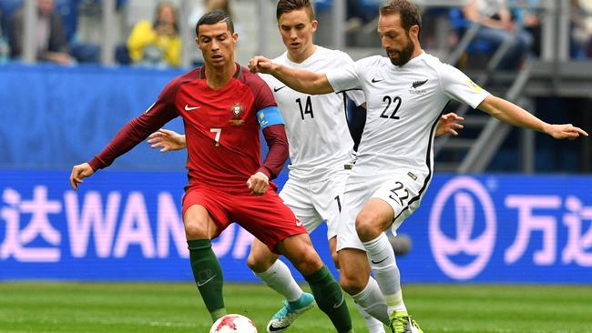 Portugal superstar Cristiano Ronaldo and New Zealand's Wellington Phoenix captain Andrew Durante during the 2017 Confederations Cup in Saint Petersburg, Russia in 2017. Picture: Mladen Antonov