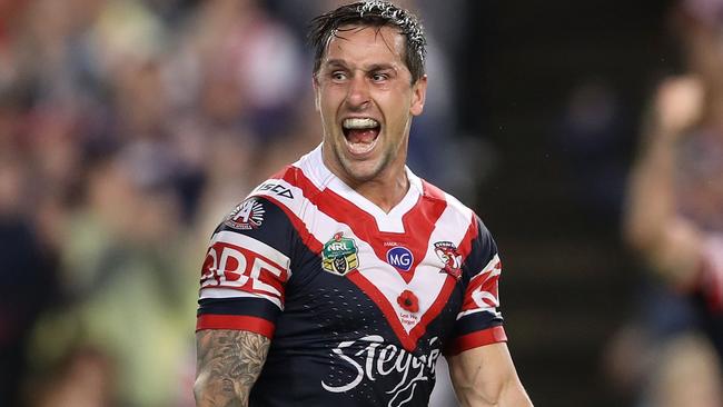 SYDNEY, AUSTRALIA - APRIL 25:  Mitchell Pearce of the Roosters celebrates kicking a field goal to claim golden point victory during the round eight NRL match between the Sydney Roosters and the St George Illawarra Dragons at Allianz Stadium on April 25, 2017 in Sydney, Australia.  (Photo by Mark Kolbe/Getty Images)