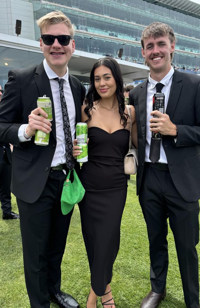 Damian Williams, Kiara Yurcevic and Lachy Green at Flemington for Derby Day on November 2, 2024. Picture: Phillippa Butt