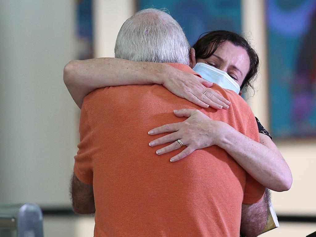 A traveler (R) from New Zealand hugs a loved one upon arrival at Brisbane Airport on the first 'safe travel zone' service between New Zealand and Queensland.Picture: Jono Searle/Getty Images