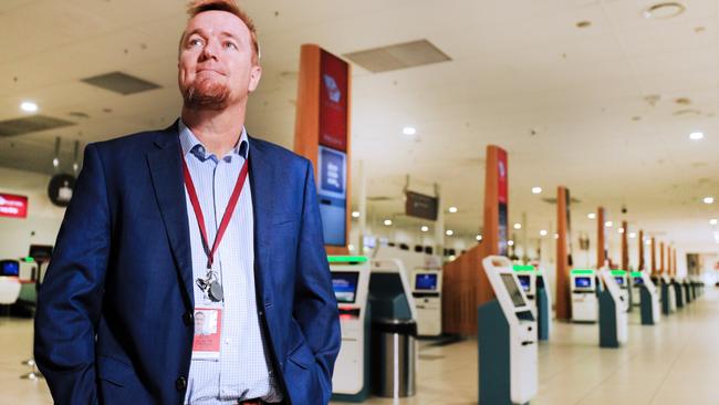 Queensland Aircorp Limited CEO Chris Mills in an empty Gold Coast Airport check in area. Photo Scott Powick Newscorp