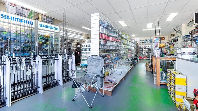 The interior of the Sneaky Fisho tackle shop, before it closed, showing the Shimano rod display stands. Shimano Australia is owed close to $120,000. Picture: Supplied