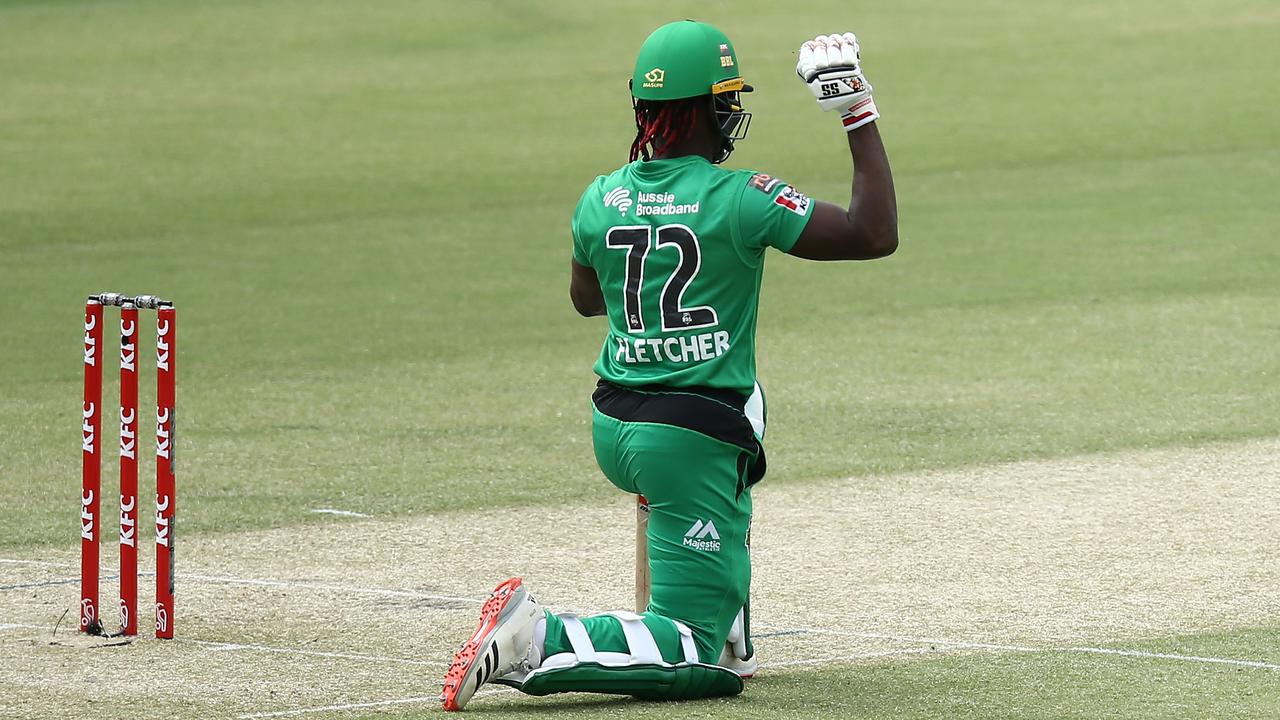 Stars import Andre Fletcher takes a knee before a Big Bash match. Picture: Jason McCawley/Cricket Australia via Getty