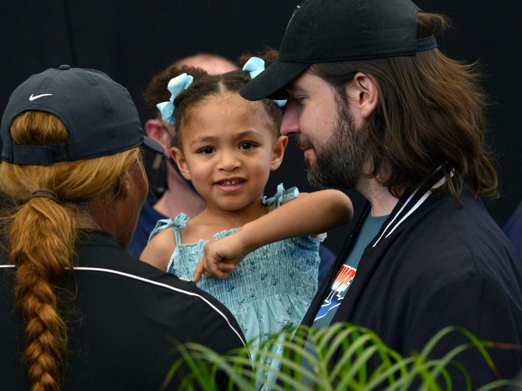 The couple with daughter Alexis Olympia in Adelaide on January 29, 2021. (Photo by Brenton Edwards / AFP)