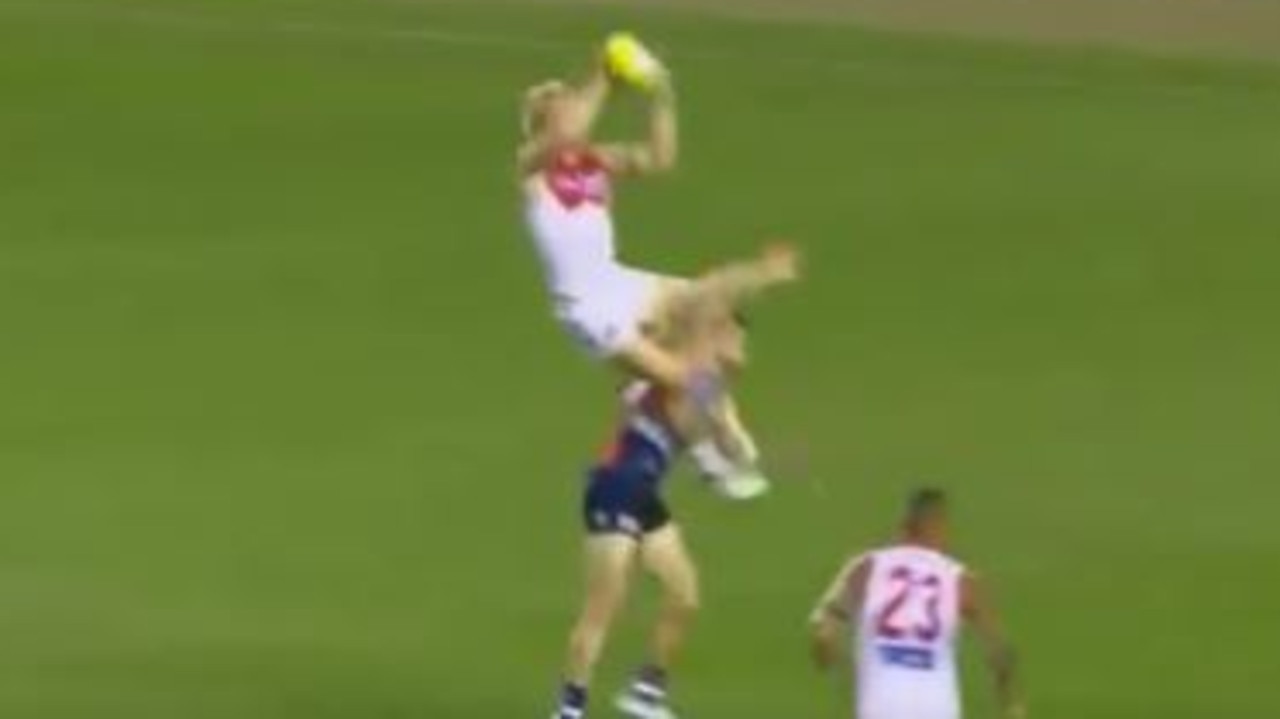 Sydney's Isaac Heeney takes to the skies.
