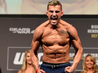 Mirsad Bektic steps onto the scale before UFC 204 in 2016.