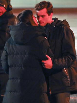 First kiss ... Dakota Johnson and Jamie Dornan on the 50 Shades of Grey set in Vancouver.