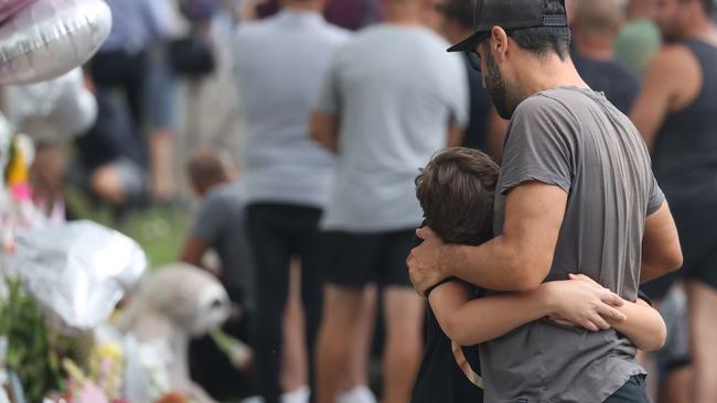 People react at the crash sight after the fatality last February. Picture: John Grainger