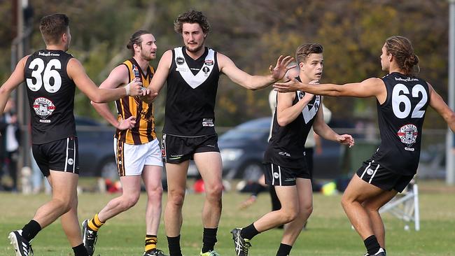 William Paynter (Adelaide University celebrates after he kicked a goal during the first quarter last week. Picture: Stephen Laffer