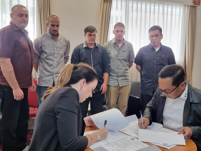 Sunday 15-12-2024 Lauren Richardson - minister councillor for home affairs and regional director for SE Asia sits opposite Erwedi Supriyatno, director of inmate affairs at directorate general of corrections., as she signs out 5 of the remaining Bali 9 prisoners into Australian custody.  Picture - Supplied