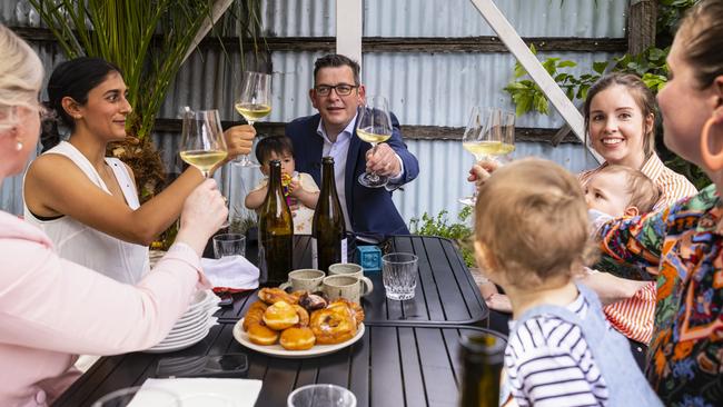 Daniel Andrews celebrating the end of lockdown on Friday with a group of young mums. Picture: Getty Images