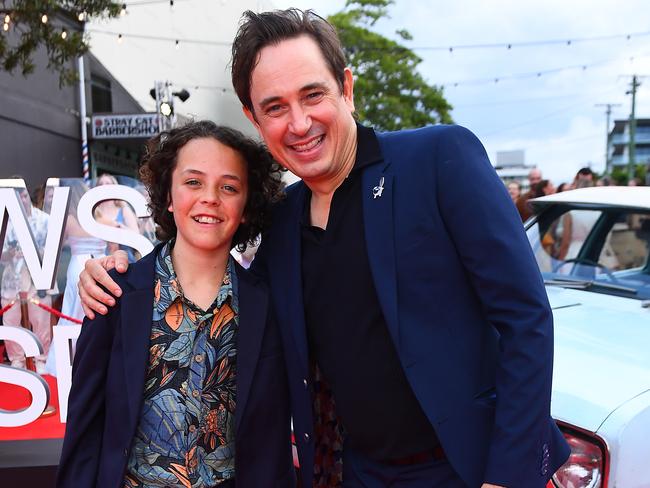 BRISBANE, AUSTRALIA - JANUARY 09: Felix Cameron and Trent Dalton pose for photographs during the Netflix global premiere of "Boy Swallows Universe" at New Farm Cinemas on January 09, 2024 in Brisbane, Australia. (Photo by Jono Searle/Getty Images for Netflix)