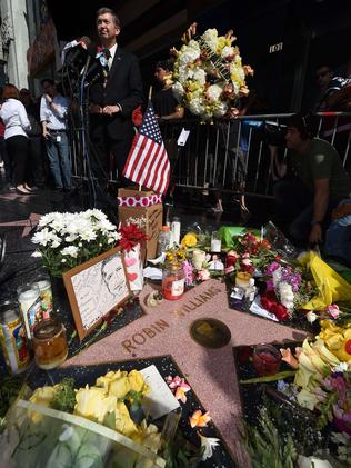 Leron Gubler, president and CEO of the Hollywood Chamber of Commerce, speaks at Williams' star on the Hollywood Walk of Fame. Picture: Robyn Beck