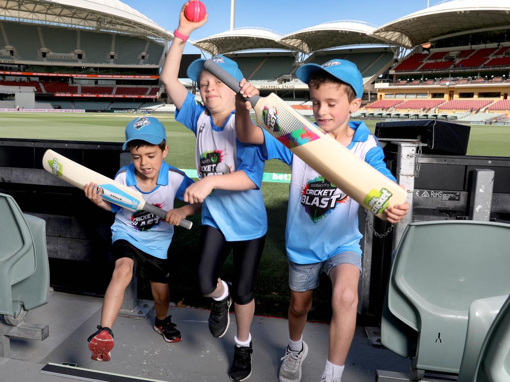 Cricket Australia’s James Allsopp credited volunteers at community clubs and Woolworths Cricket Blast centres with doing “an amazing job” in the two seasons since Covid began. Pictured from left at Adelaide Oval in 2021 are Ethan Hunnisett, Ella Allen and Jack Jarman. Picture: Dean Martin