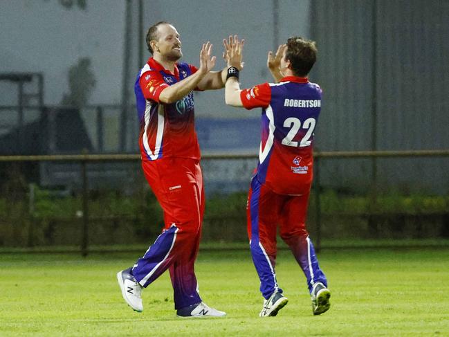 Mulgrave's Jake Roach and Will Robertson celebrate catching out Andrew Phelps in the Cricket Far North (CFN) T20 A Grade grand final match between Cairns Rovers and Mulgrave, held at Griffiths Park, Manunda. Picture: Brendan Radke