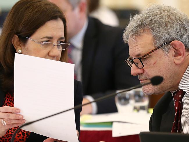 Premier Annastacia Palaszczuk speaks with chief of staff David Barbagallo. Picture: AAP/Jono Searle