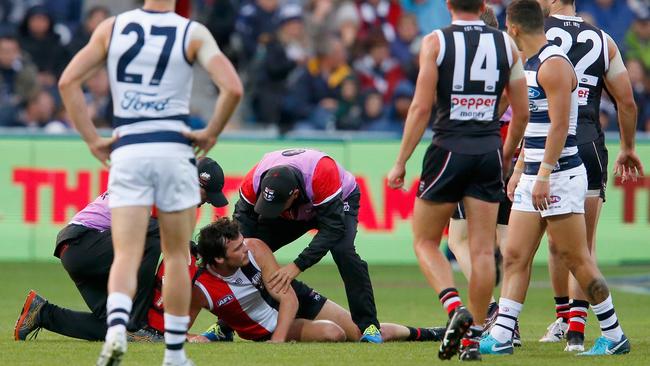 Doctors attend to Roberton after he collapsed in April, 2018. Picture: Darrian Traynor/Getty Images