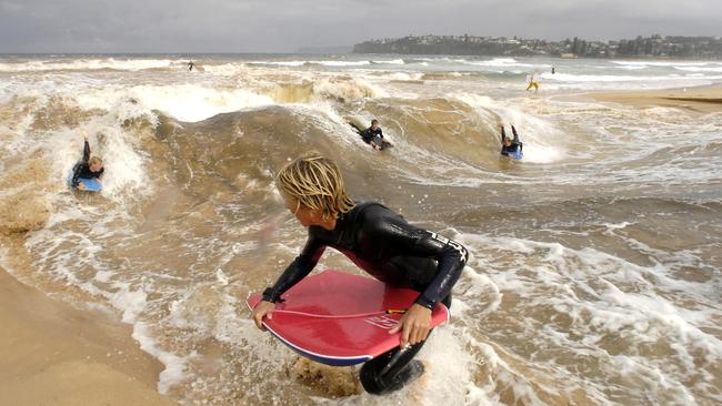 Authorities say people risk becoming trapped by standing waves or having their health affected by water rushing from Northern Beaches lagoons. Picture: Martin Lange