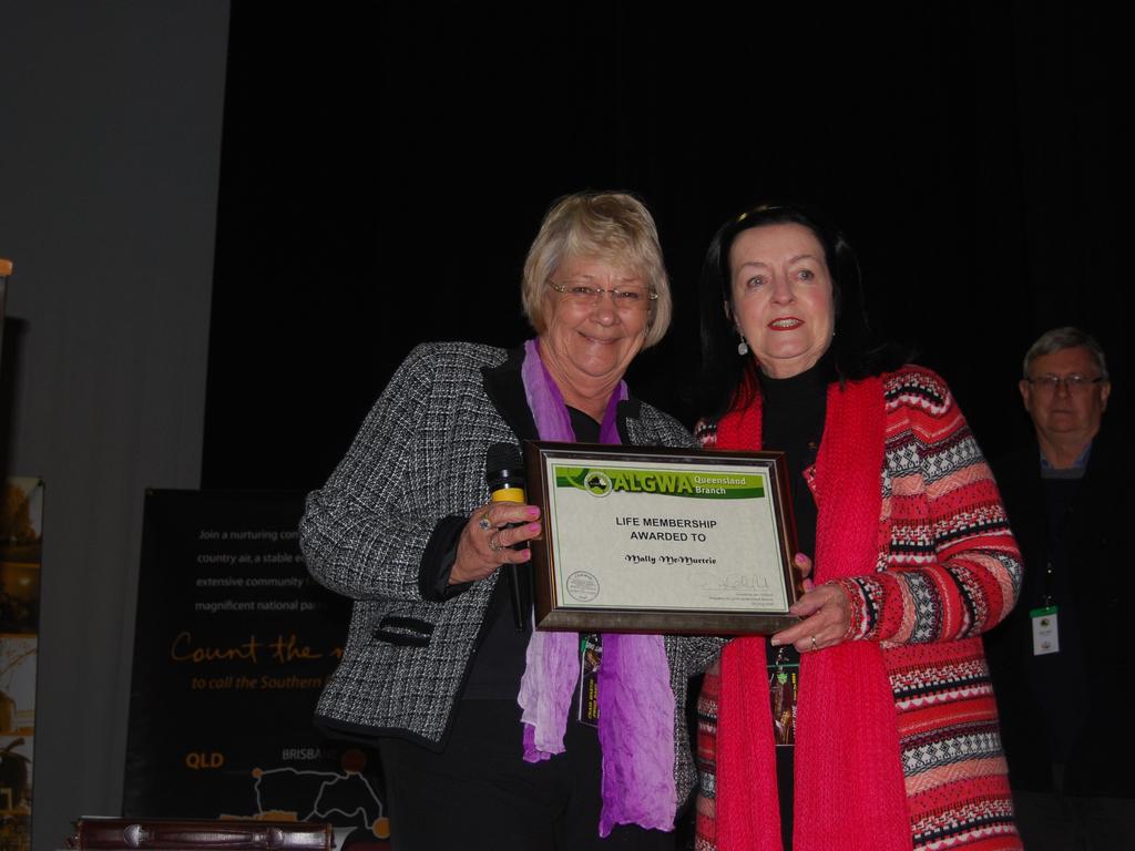 Mally McMurtrie (right) recieving her ALGWA life membership at a state conference in Warwick in 2012. Photo Contributed