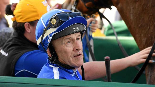 Jockey Jeff Lloyd unsaddles Savsgold after another win at the Ipswich Racetrack. Picture: Rob Williams