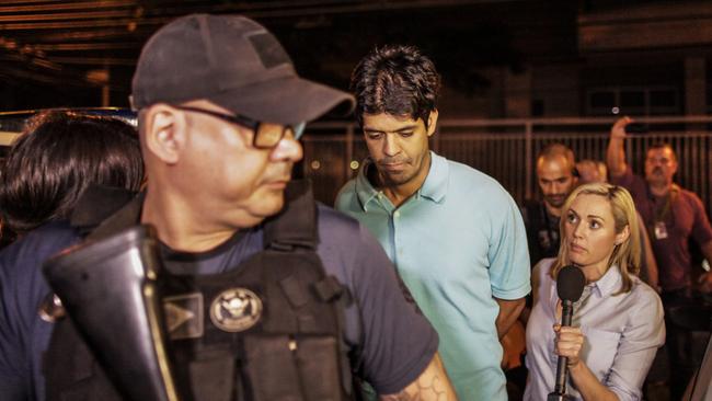 Marcelo Santoro in custody after being captured by police in Rio de Janeiro. Picture Supplied.