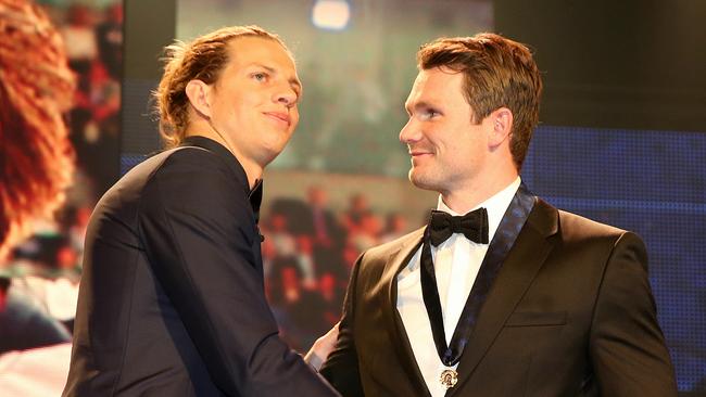 Brownlow Medallist Nat Fyfe, left, and Patrick Dangerfield have both had to deal with being removed as leading contenders for a second medal while carrying an asterisk against their names from tribunal bans. Changing the Brownlow voting and criteria runs the risk of corrupting the medal’s standing. Picture: Michael Klein