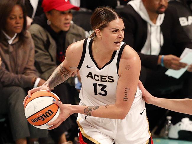 NEW YORK, NEW YORK - OCTOBER 18: Cayla George #13 of the Las Vegas Aces looks to pass against Breanna Stewart #30 of the New York Liberty in the third quarter during Game Four of the 2023 WNBA Finals at Barclays Center on October 18, 2023 in New York City. (Photo by Sarah Stier/Getty Images)