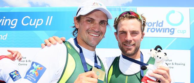 Alex Hill and Josh Booth celebrate gold in the Men's Pair at the 2019 World Rowing Cup.