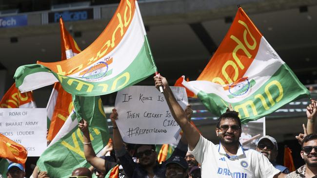 Indian supporters cheer for their team on day five of the fourth cricket Test match between Australia and India at the MCG. Picture: AFP