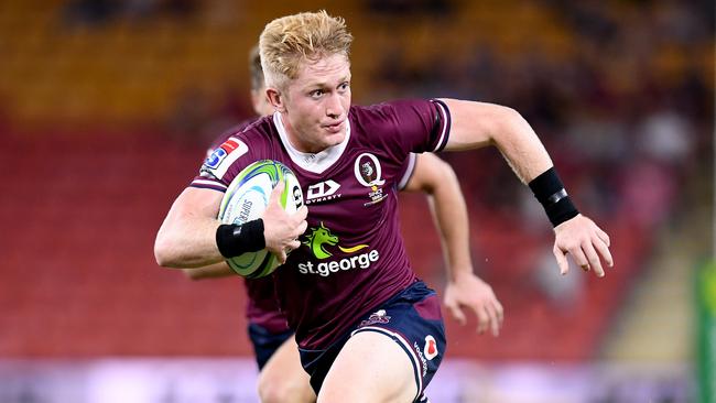 BRISBANE, AUSTRALIA - FEBRUARY 22: Isaac Lucas of the Reds breaks away from the defence during the round four Super Rugby match between the Reds and the Sunwolves at Suncorp Stadium on February 22, 2020 in Brisbane, Australia. (Photo by Bradley Kanaris/Getty Images)