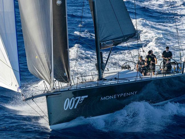 This handout photograph taken on December 26, 2022 and released by Rolex shows yacht Moneypenny heading towards Hobart during the 2022 Sydney to Hobart yacht race. (Photo by Andrea FRANCOLINI / ROLEX / AFP) / --- RESTRICTED TO EDITORIAL USE - MANDATORY CREDIT 