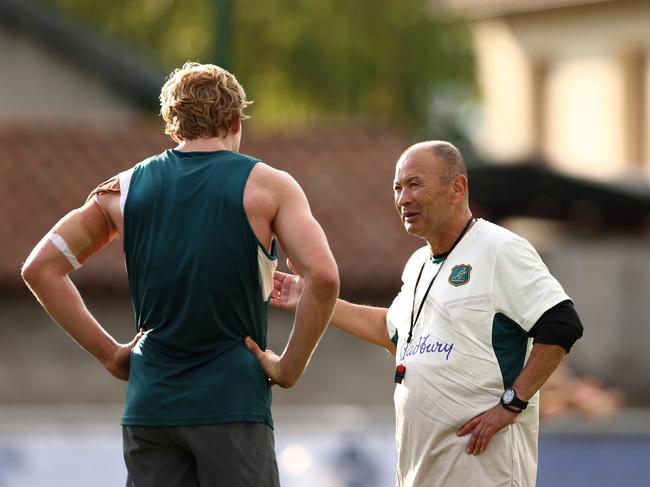 (L-R) Carter Gordon and Wallabies head Coach, Eddie Jones talk during a training session at Stade Roger Baudras. Picture: Getty Images