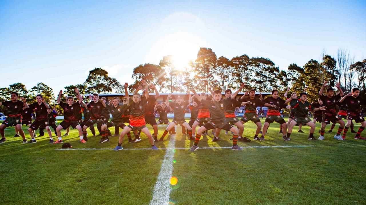 Students perform a haka at TG Millner Sportsground in Eastwood, NSW. Saturday 13th July 2019. The club held a “Back to Eastwood Day” with players from the 1969 and 1999 teams present. (AAP IMAGE/Jordan Shields)