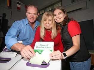 Craig Elliot, Richmond MP Justine Elliot and their daughter Alex cast their votes. Picture: Scott Powick