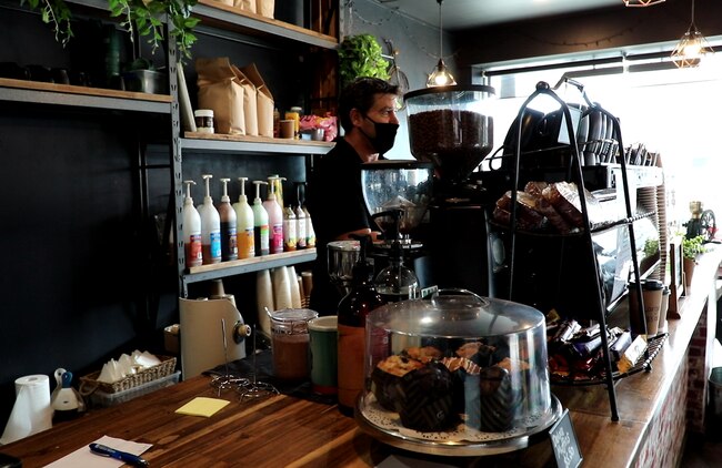 Simon Wilson getting his barista on at Screaming Beans. Picture: Simran Gill