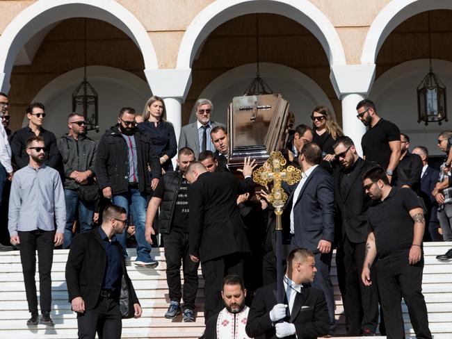 Family and friends attand John Macris’s funeral. Picture: Angelo Christofilopoulos