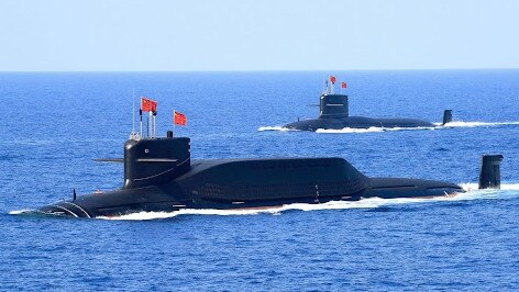 Chinese nuclear-powered missile and attack submarines parade for Chairman Xi Jinping. Picture: PLAN