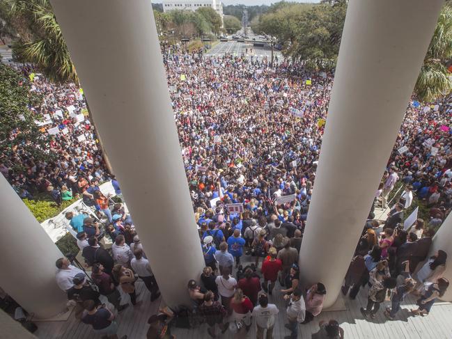 Protesters rally against gun violence on the steps of the old Florida Capitol in Tallahassee, Fla., Wednesday, Feb 21, 2018. Students at schools across Broward and Miami-Dade counties in South Florida planned short walkouts Wednesday, the one week anniversary of the deadly shooting at Marjory Stoneman Douglas High School.  (AP Photo/Mark Wallheiser)