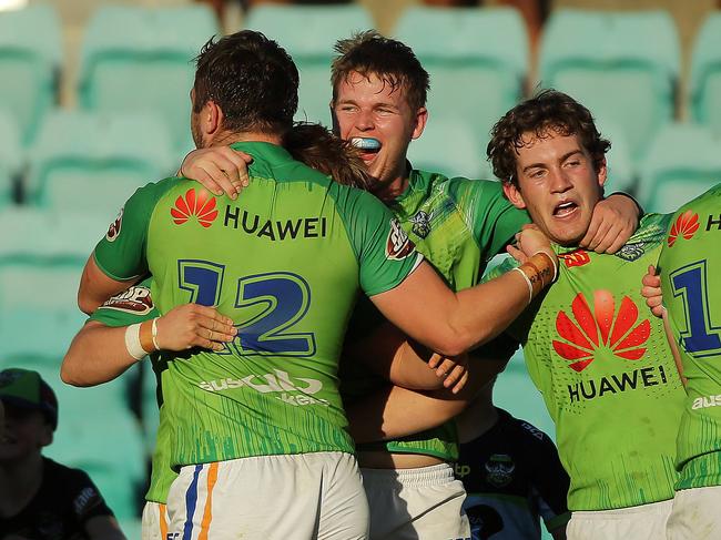 SUNDAY TELEGRAPH - Pictured at Leichhardt Oval today are the Canberra Raiders players celebrating as they take the win against the Manly Sea Eagles in the SG Ball Semi Final. Picture: Tim Hunter.