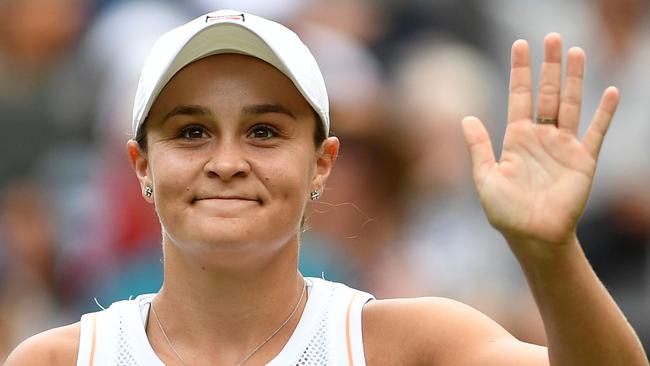 Ashleigh Barty celebrates beating China's Zheng Saisai last night. Picture: AFP