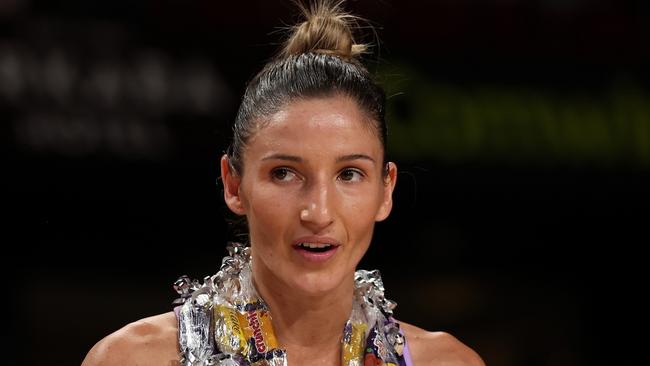ADELAIDE, AUSTRALIA - APRIL 13: Kim Ravaillion celebrates her 150th SSN match of the Queensland Firebirds during the round one Super Netball match between Adelaide Thunderbirds and Queensland Firebirds at Adelaide Entertainment Centre, on April 13, 2024, in Adelaide, Australia. (Photo by Maya Thompson/Getty Images)