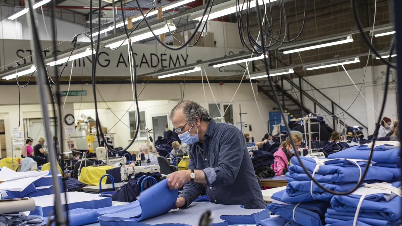 Employees at 'Fashion Enter' make scrubs for NHS staff on April 24, 2020 in London, England. Picture: Dan Kitwood/Getty Images