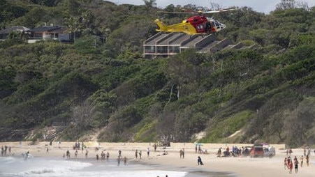 The Westpac Life Saver Rescue Helicopter arrives at Clarkes Beach following one of the incidents. Picture: Craig Parry