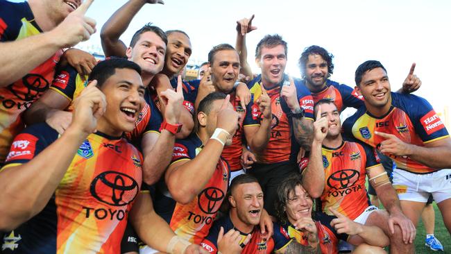 The Cowboys celebrate winning the Nines in 2014. Pic Mark Evans