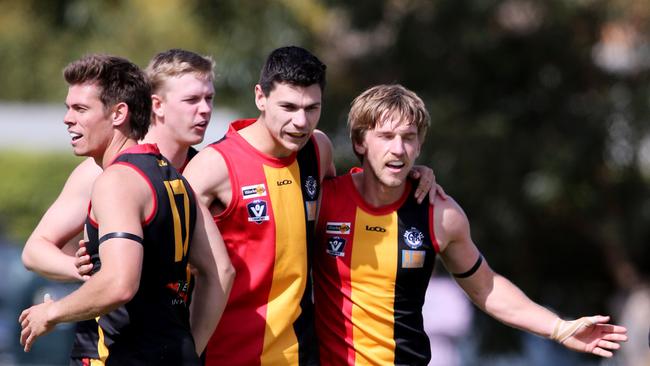 GFL: St Joseph's v North Shore. St Josephs players Callum Mitchell, Paddy De Grandi and Jack Mullen celebrate a goal. Picture: Mike Dugdale