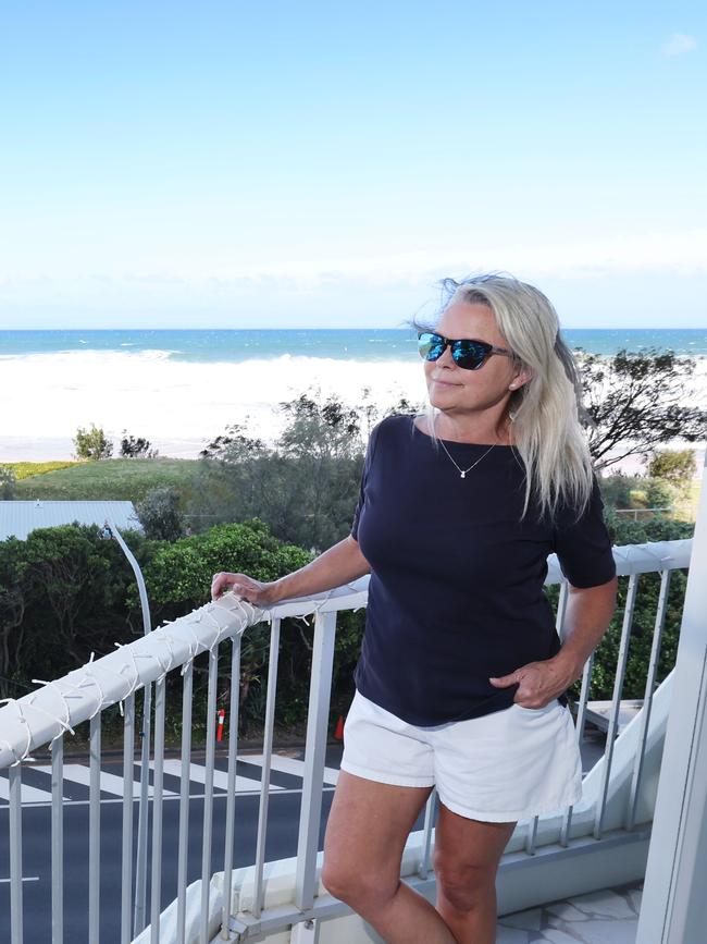 Gold Coast gets ready for Tropical Cyclone Alfred. Jen Masters keeping an eye on the weather from her Main Beach unit. Picture Glenn Hampson